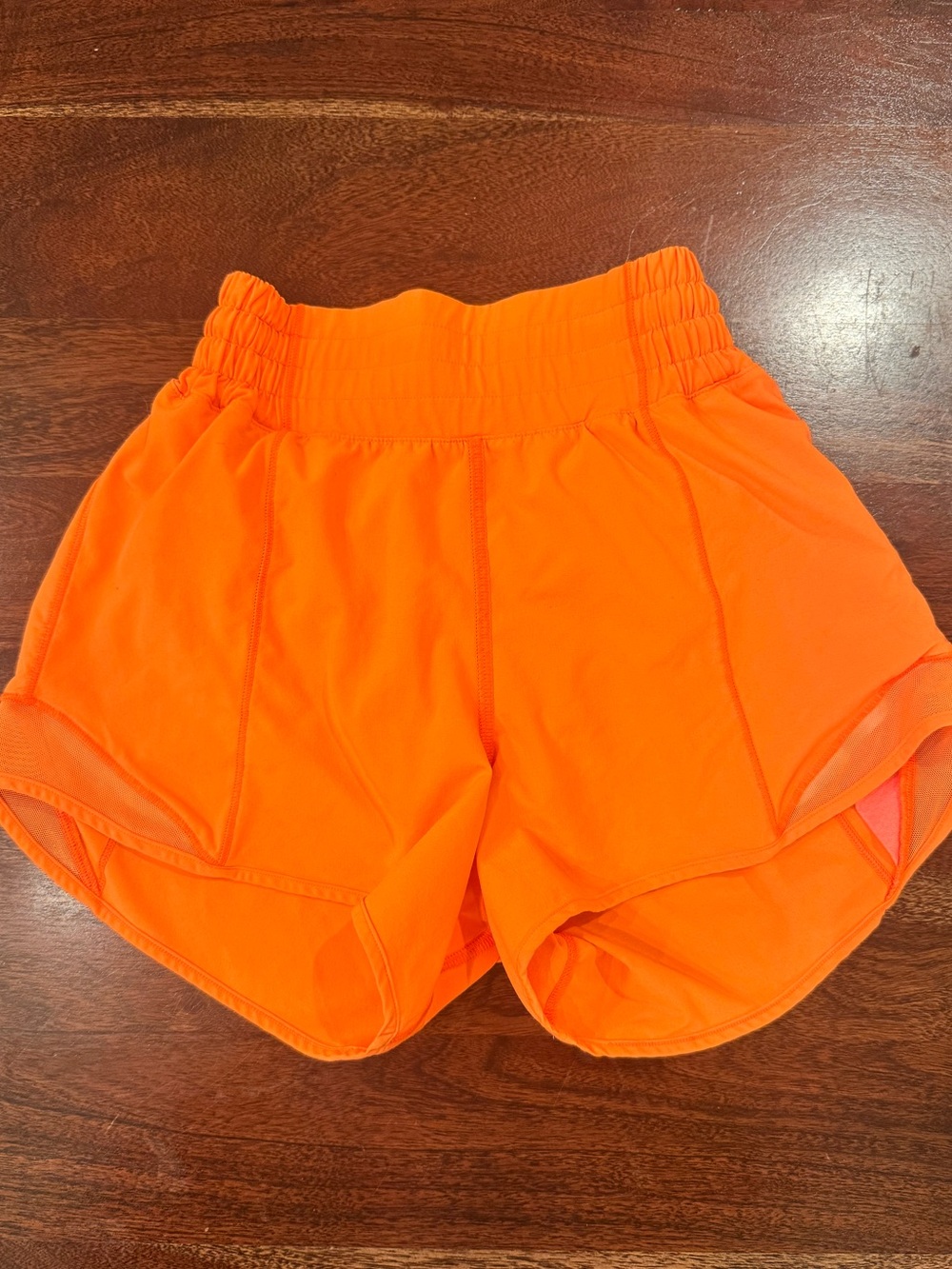 lululemon athletica Neon Orange Hottie Hot 4in shorts